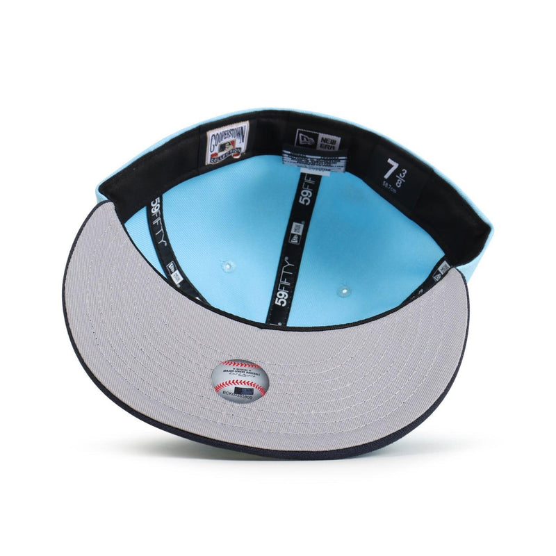 Baseball cap with black brim and gray body on a white background