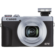 Front view of Canon PowerShot G7 X Mark III with flash raised